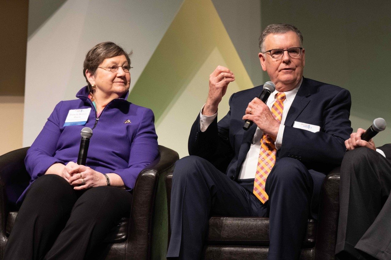 Michael Friedlander (at right), executive director of the Fralin Biomedical Research Institute, talked about how scientists continually try to improve ideas alongside  Pamela Davis, professor with Case Western Reserve University.