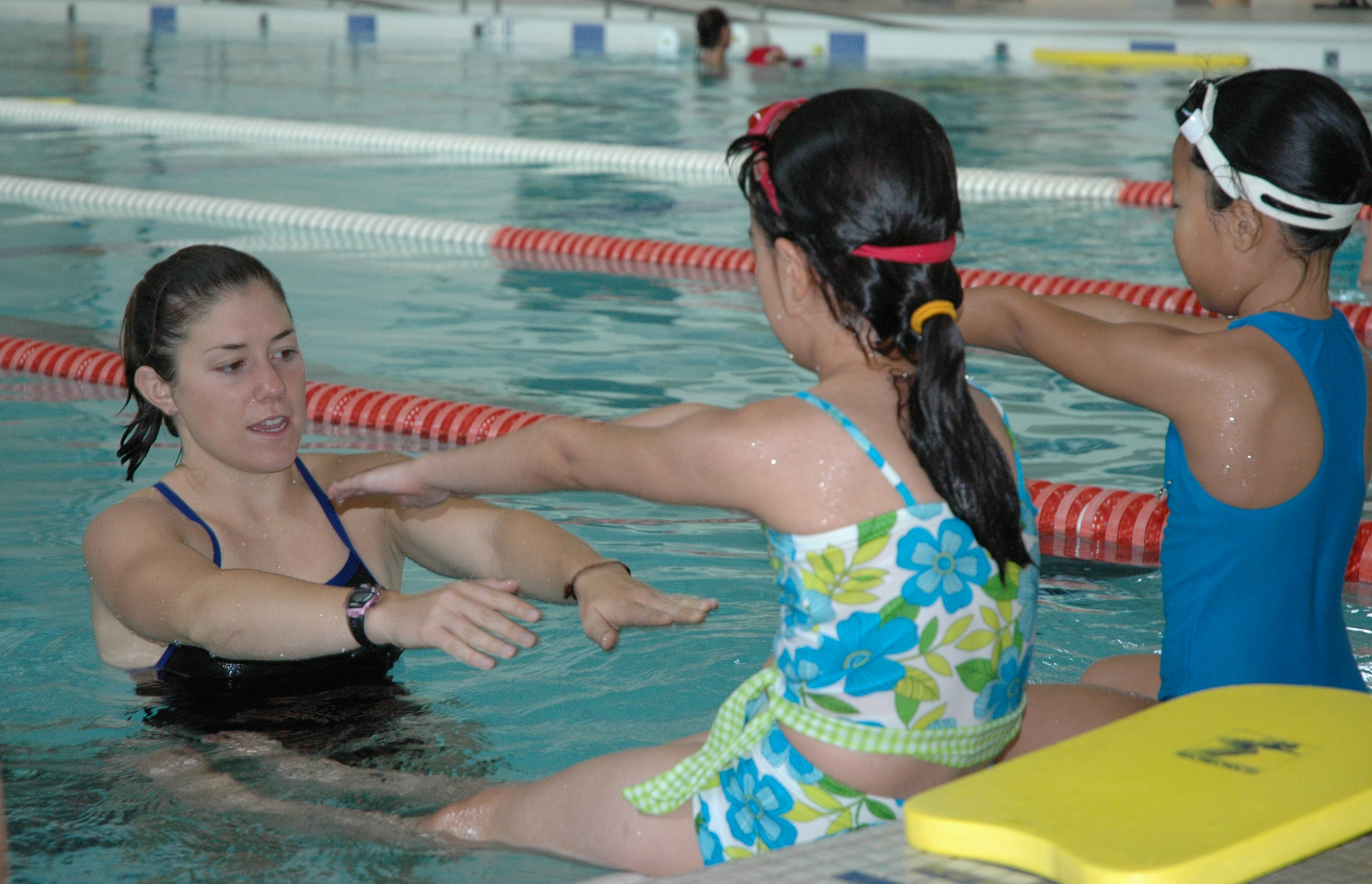 Community members learn swim techniques.