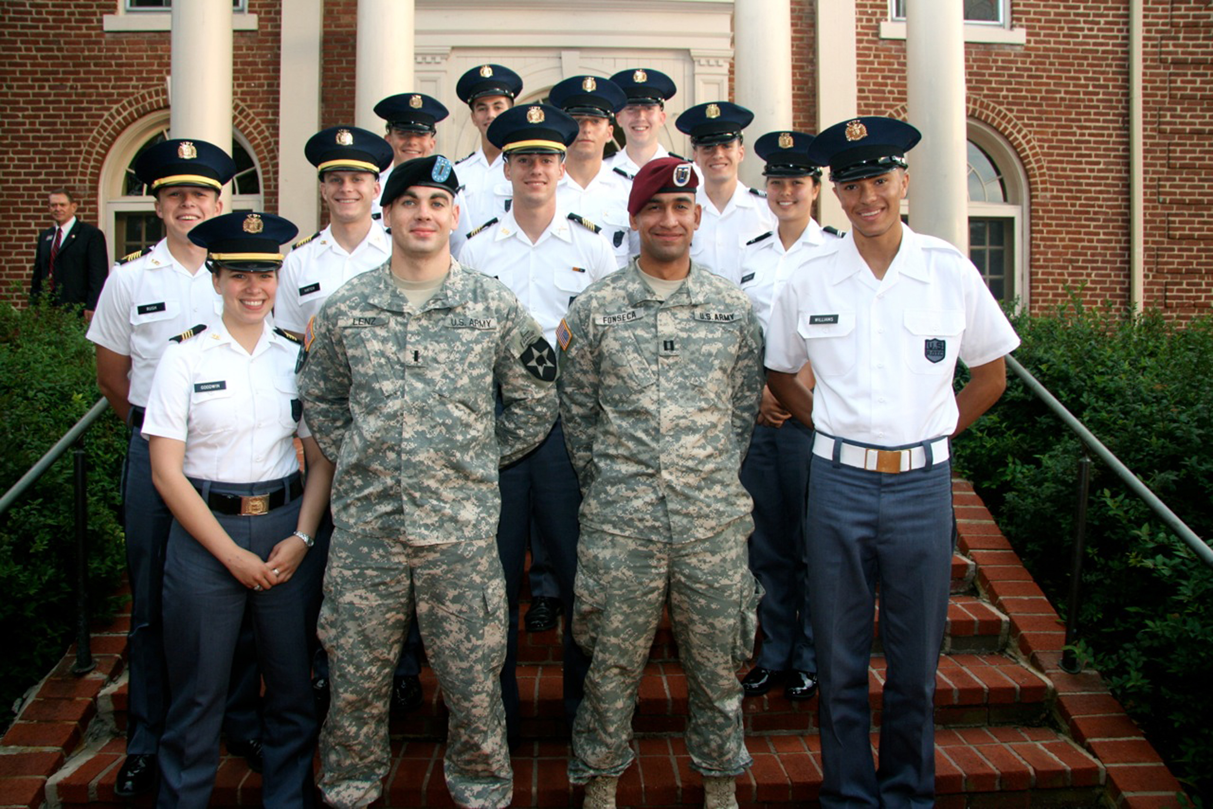 1st Lt. Thomas Lenz (center, left), U.S. Army, Virginia Tech Corps of Cadets Class of 2008 and Capt. Roberto Fonseca (center, right), U.S. Army, Virginia Tech Corps of Cadets Class of 2004, previous Gunfighter panelists standing with members of the Corps of Cadets
