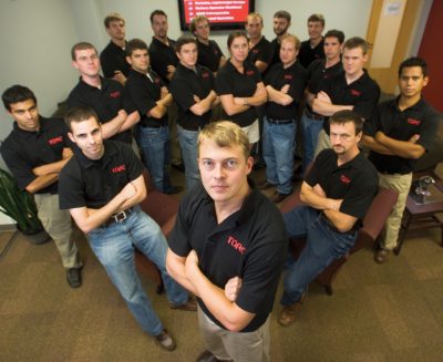 TORC Robotics co-founder and CEO Michael Fleming, a graduate of Virginia Tech, with his team