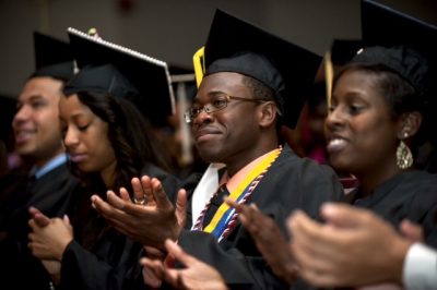 Graduates applaud at Donning of the Kente.