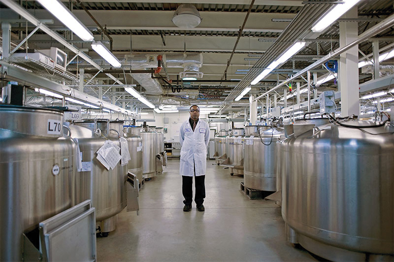 Photo of man standing in biomaterials lab