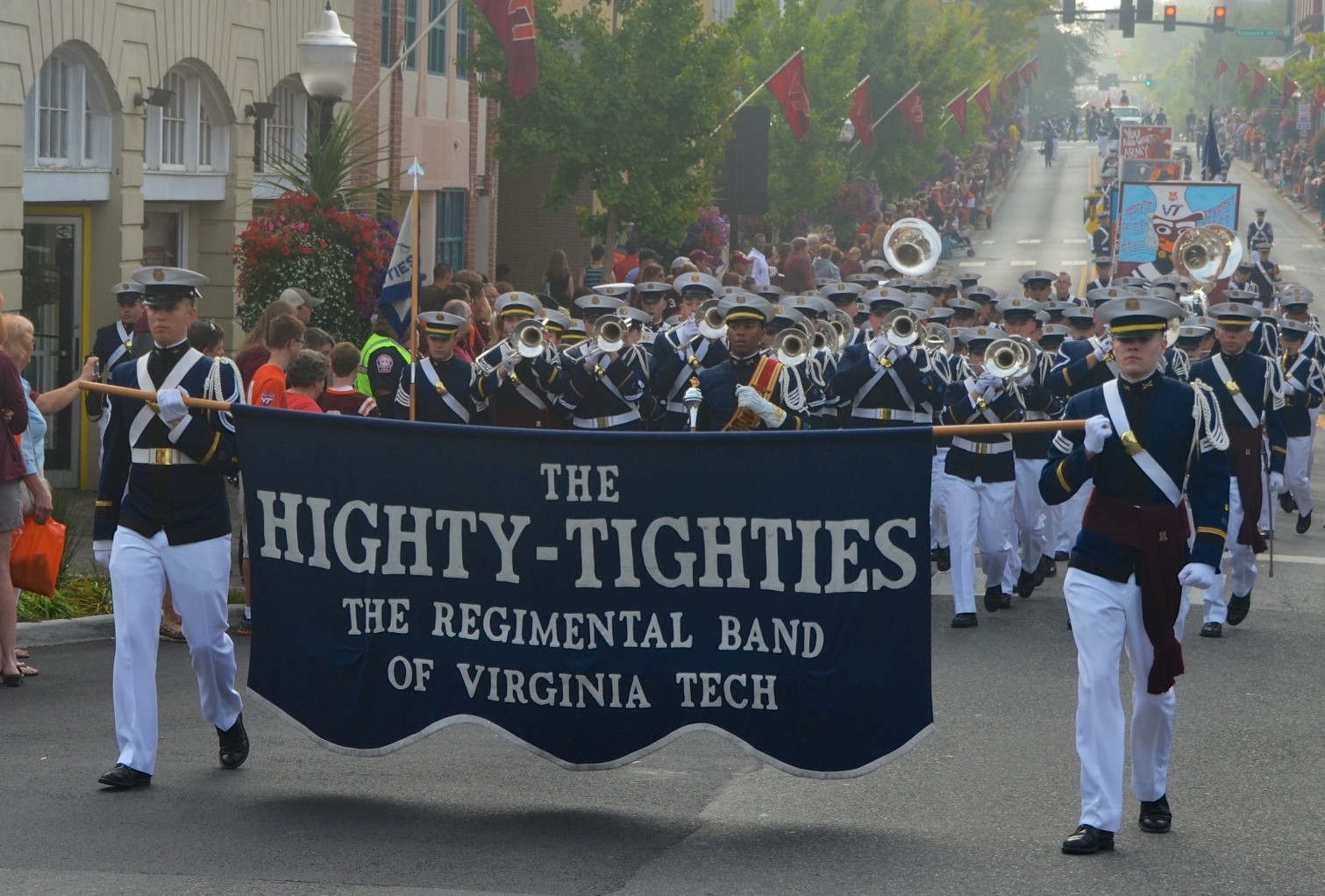 The Highty-Tighties march in a parade in downtown Blacksburg