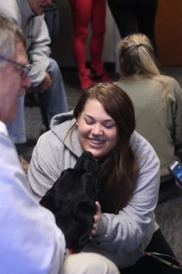 ODU student with a therapy dog