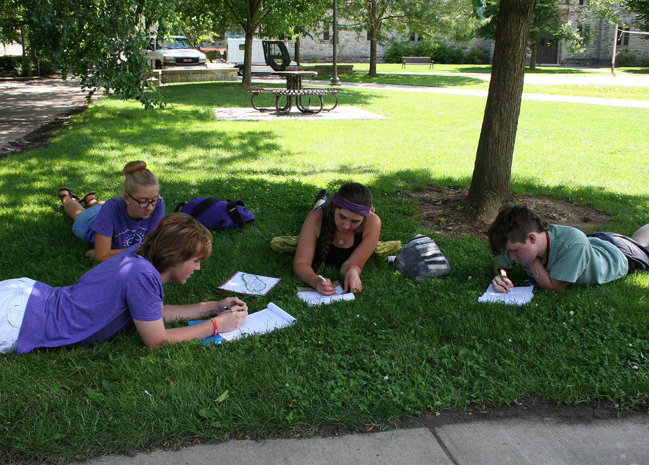 Students outdoors participate in last year's All Write workshop. 