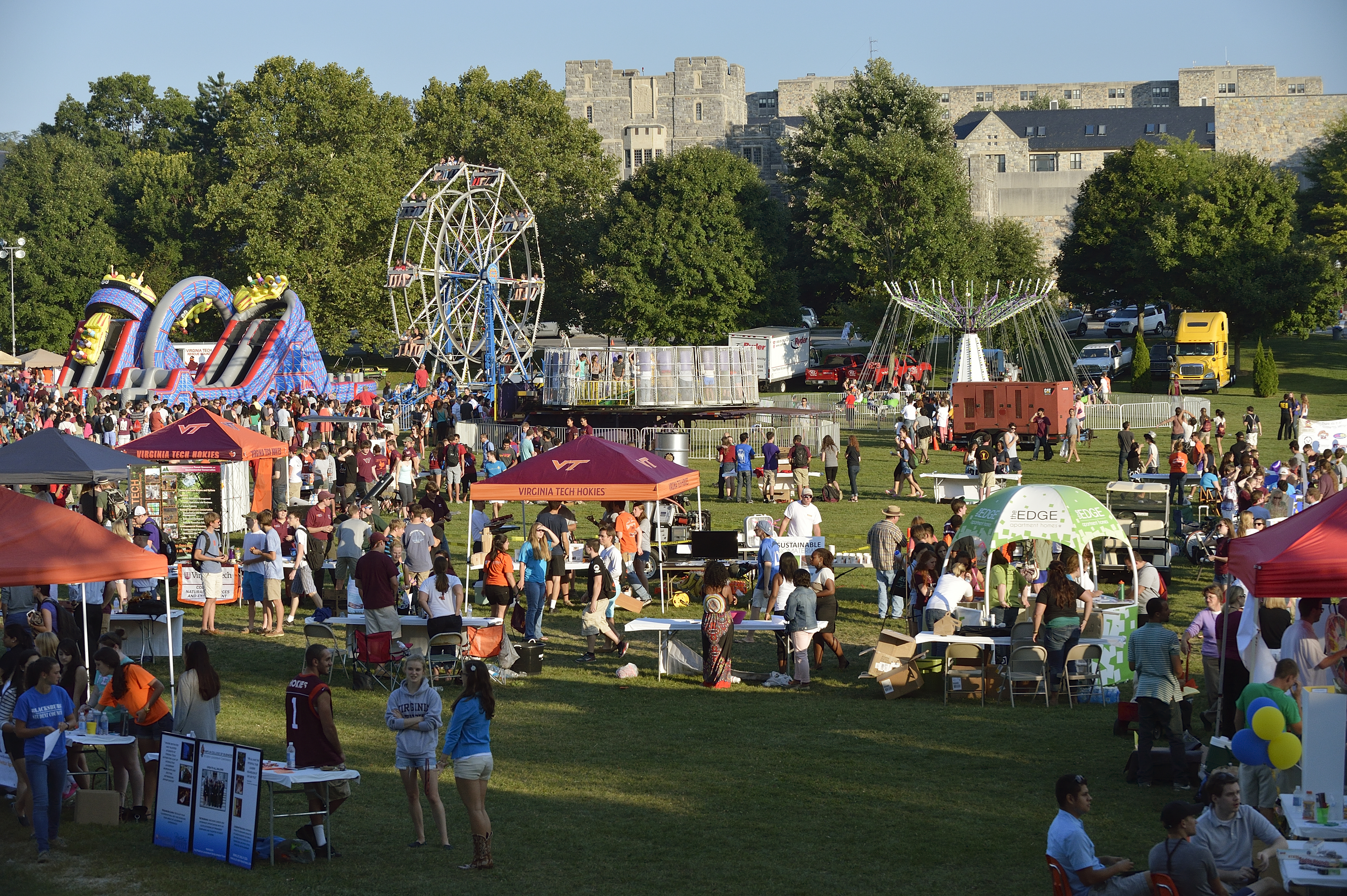 Wide shot of drillfield filled with activities for Gobblerfest 2013