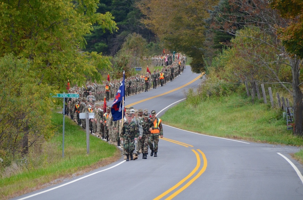 The Corps of Cadets march up a road during the 2013 Fall Caldwell March.