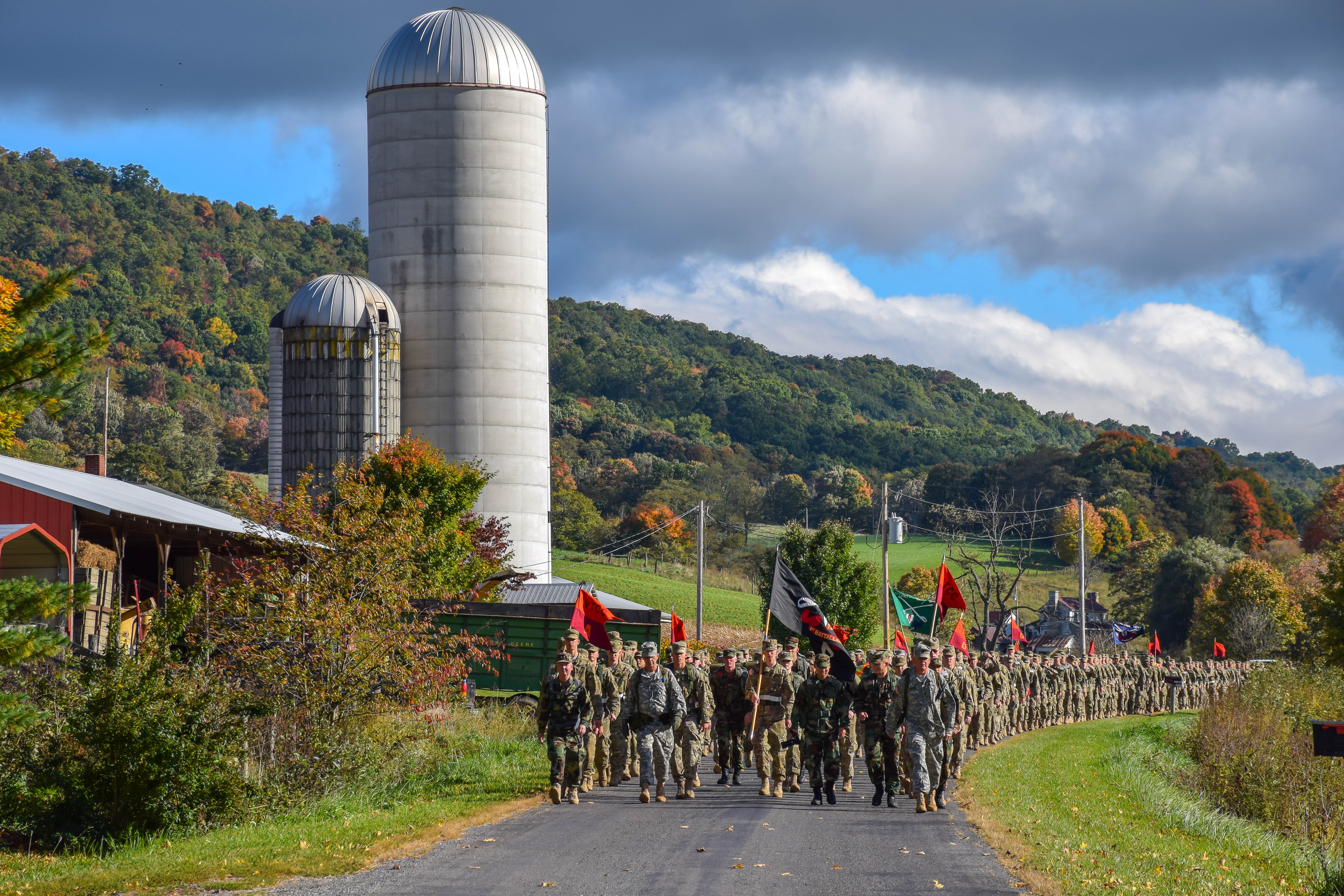 The Virginia Tech Corps of Cadets Class of 2018 march down a local road on the Fall Caldwell March in Oct. 2014.