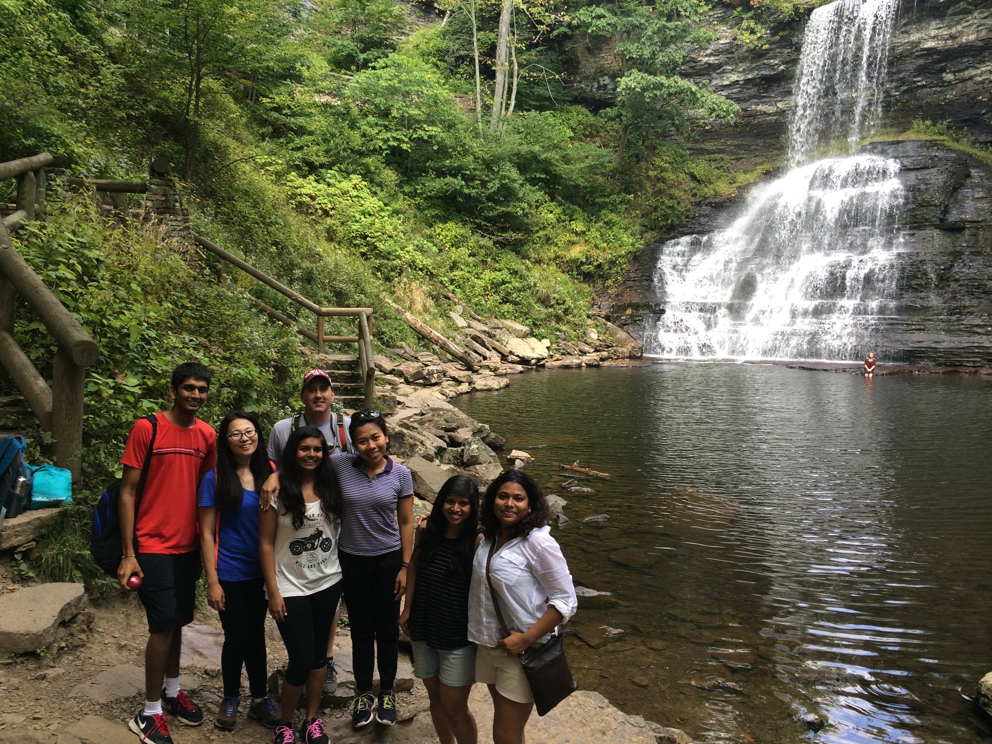 International students pose infront of the Cascades