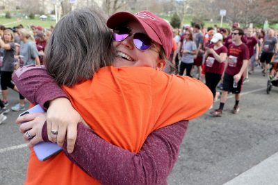 Two women hug during the 2018 Run in Remembrance