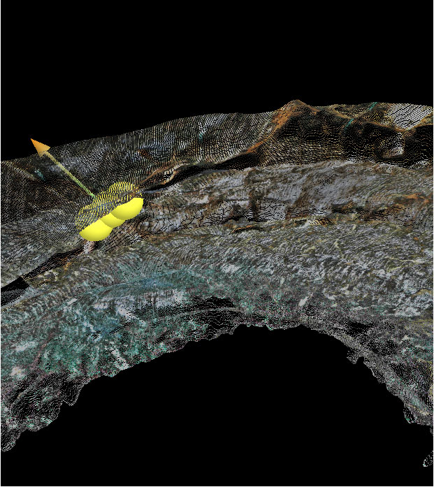 Close-up image of the tunnel roof shows a <em>gVT</em> measurement location. The arrow is a vector perpendicular to the discontinuity surface. The orientation of the arrow in space gives the azimuth and slope of the plane.