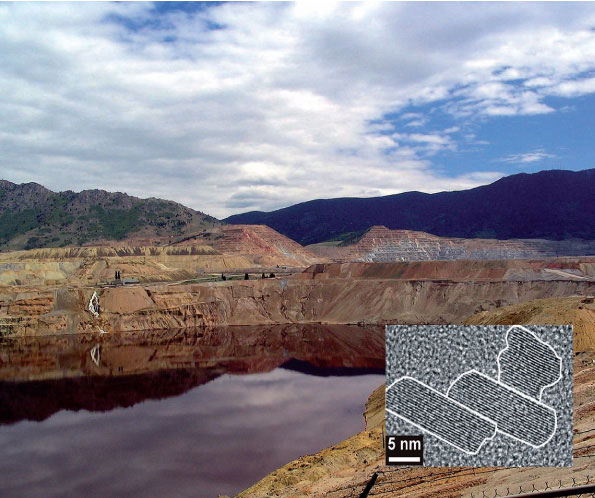 The Berkeley Pit in Butte, Mont. Surface waters that drain this area contain heavy metal contaminated mineral nanoparticles. Such environmental nanoparticles contribute to the transport of these metals up to 500 kilometers downstream. Inset: Mineral nanoparticles found in the Clark Fork River.