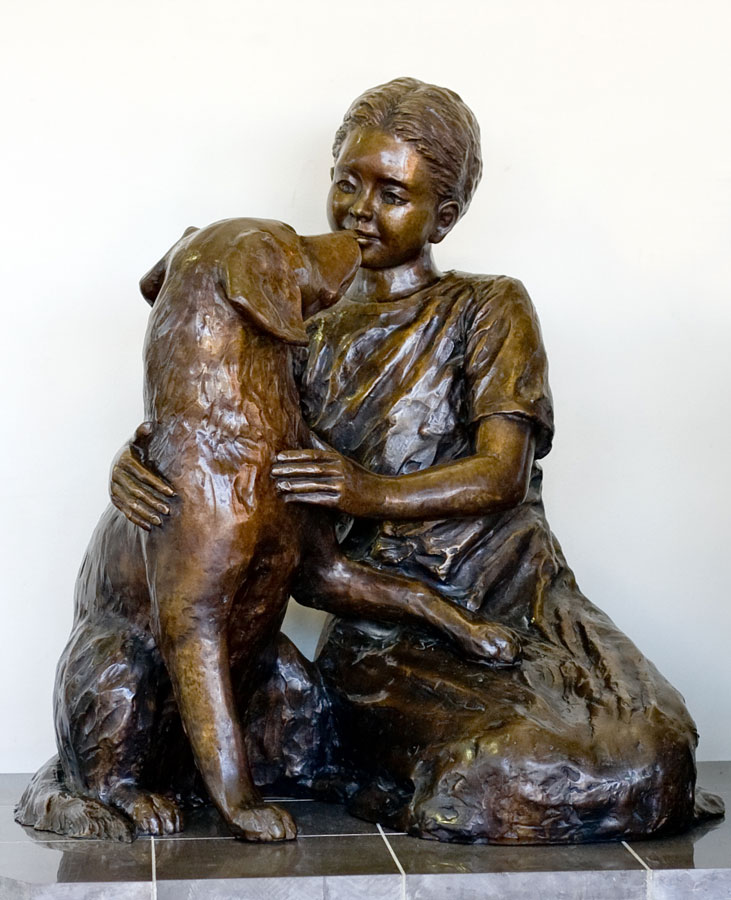 The Veterinary Memorial Fund statue sits in the Veterinary Teaching Hospital.