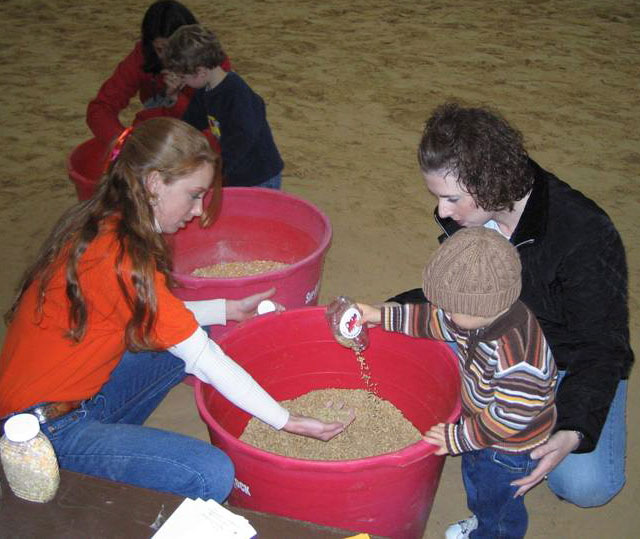 Virginia Tech students teach local youth about Virginia grains.