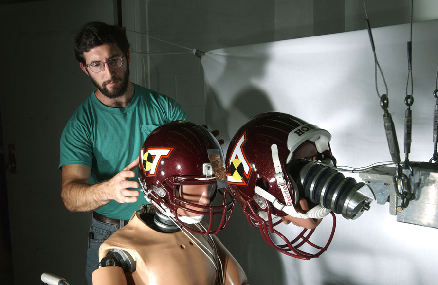 Personnel in the Center for Injury Biomechanics Laboratory at Virginia Tech study biomechanics innovations ranging from computer models of automobile drivers to a head-injury monitoring system for football players.