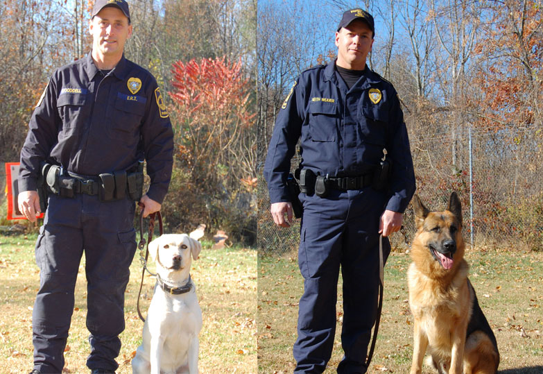 Pictured left to right are, Officer Larry Wooddell, Boomer, Officer Keith Weaver, and Boris.