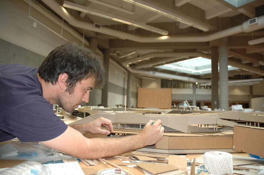 Sean Andrew Witty, who received his bachelor of architecture in spring 2008, works on a model for a project.
