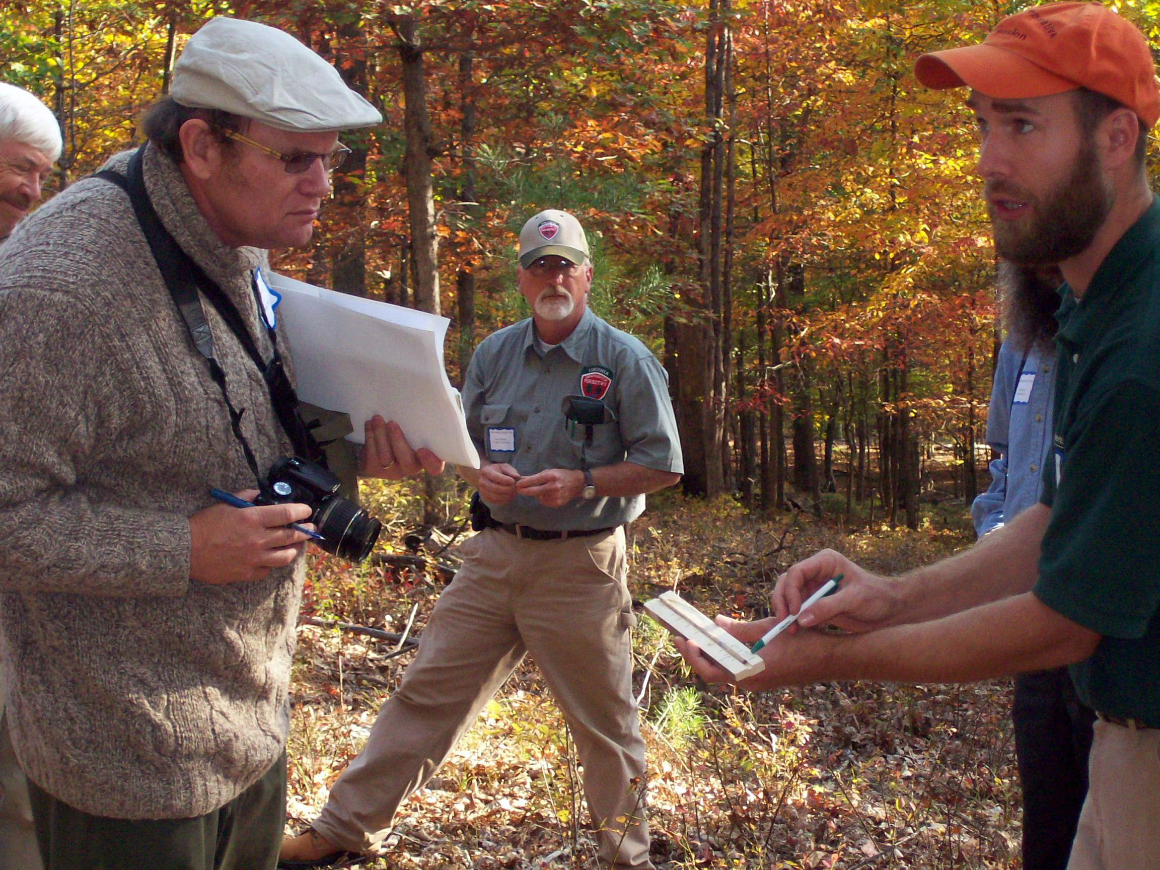 Participants in the 2008 tour in Rockbridge County learn how to determine a tree's age using growth rings.