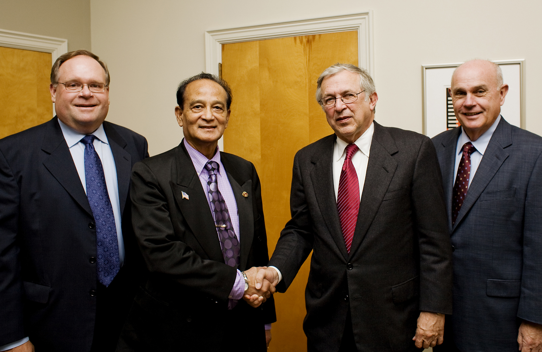 (Left to right) John Dooley, vice president for Outreach and International Affairs; S.K. De Datta, associate vice president for international affairs and director of Virginia Tech's Office of International Research, Education, and Development; Virginia Tech President Charles W. Steger; and Mark McNamee, senior vice president and provost