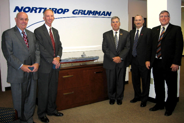 Taking part in the dedication of the new Northrop Grumman office at Virginia Tech's Corporate Research Center (CRC), are, from left to right: Mark McNamee, Virginia Tech senior vice president and provost; Joe Meredith, director of the CRC; Matt Mulherin, sector vice president and general manager, Northrop Grumman Shipbuilding; Doug Stitzel, vice president, Northrop Grumman Shipbuilding Department of Energy (DOE) Programs; and Richard C. Benson, dean of Virginia Tech's College of Engineering.</p