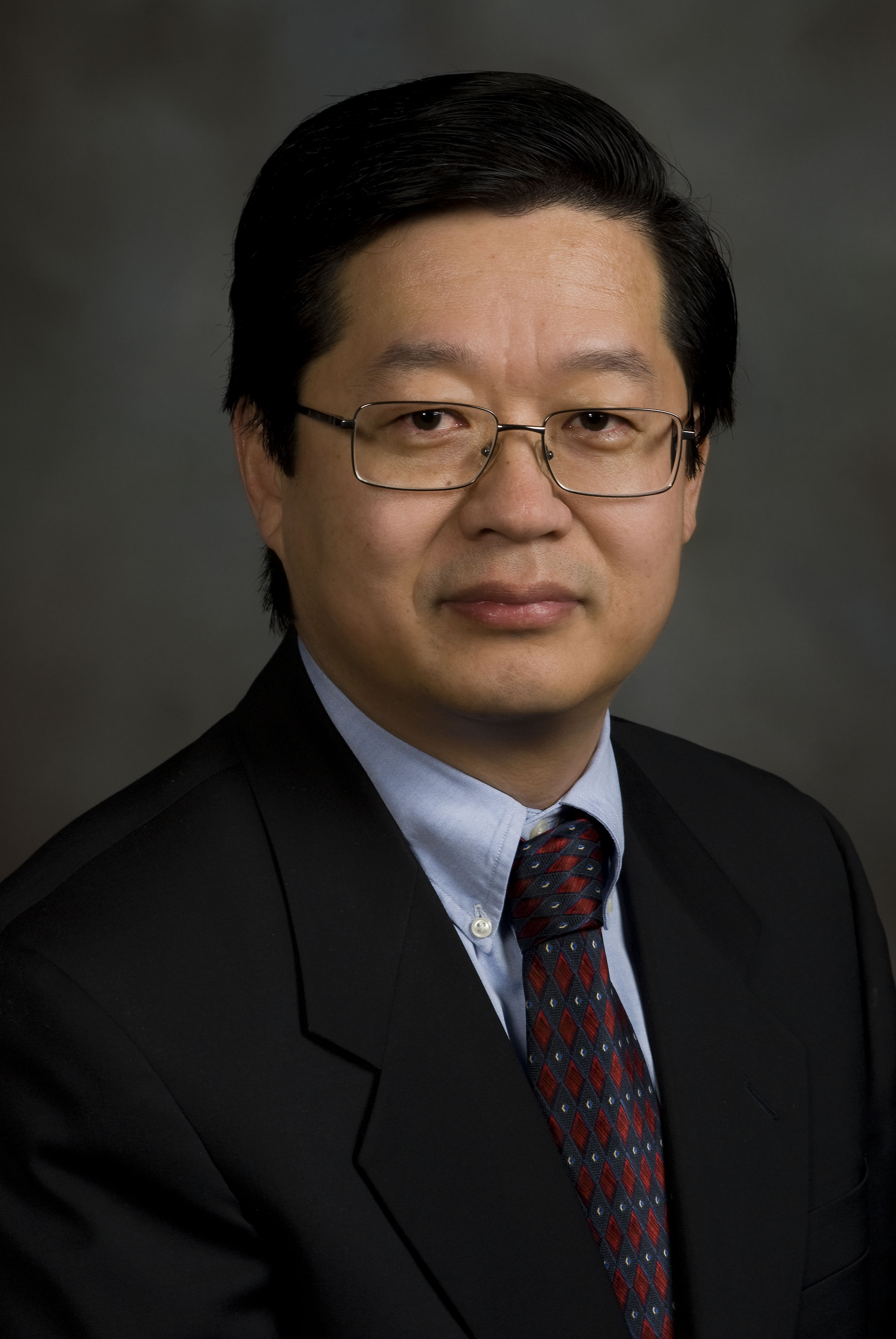 Dr. X. J. Meng