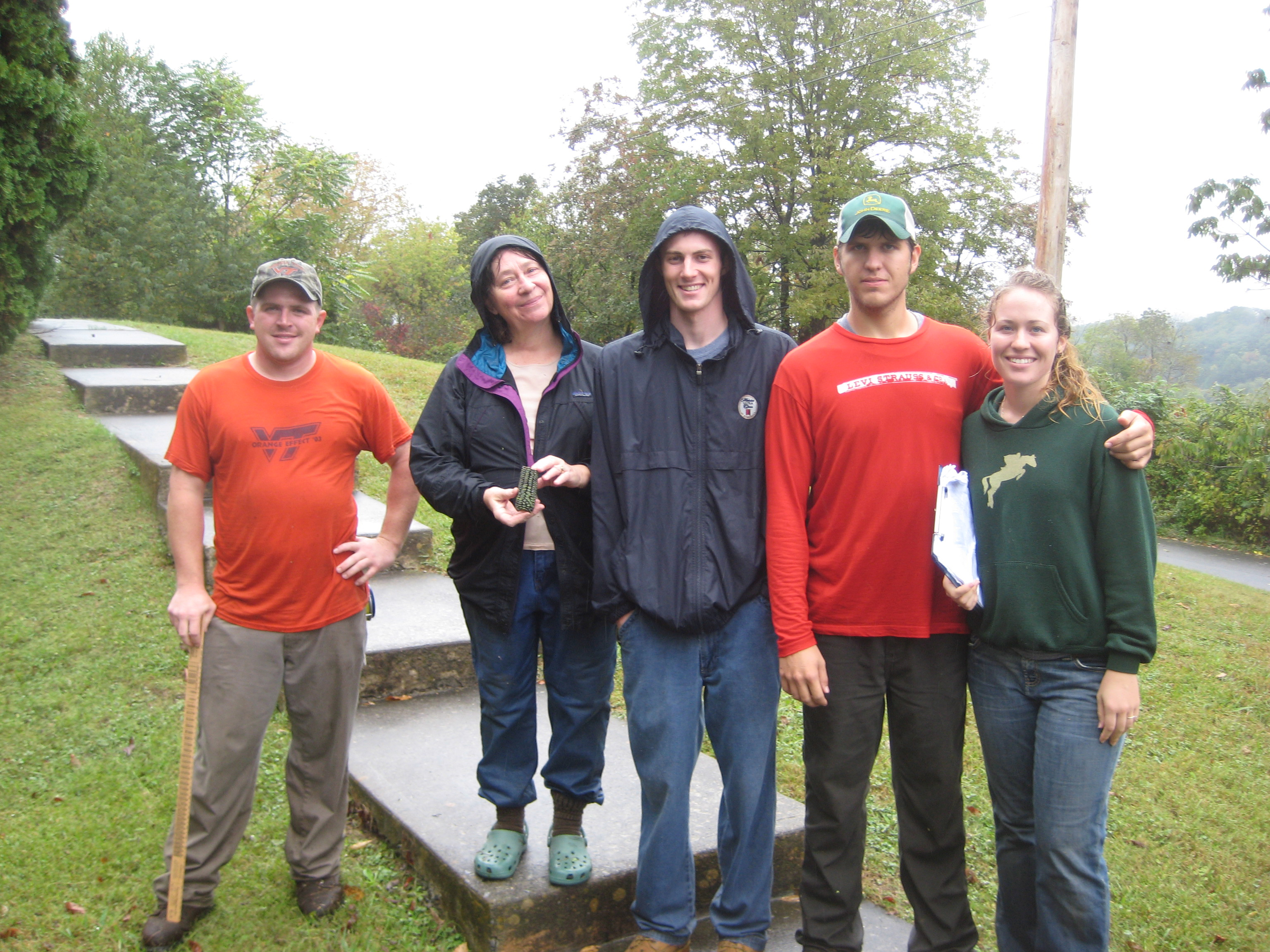 Landowner Betty Bailey (second from left) welcomed Virginia Tech service-learning students (left to right) J.B. Snelson, Chris Mernin, Spencer Blankenship, and Bonnie Lawrie on a rainy day in late September to identify possibilities for planting trees to reduce erosion along stream banks on her property.