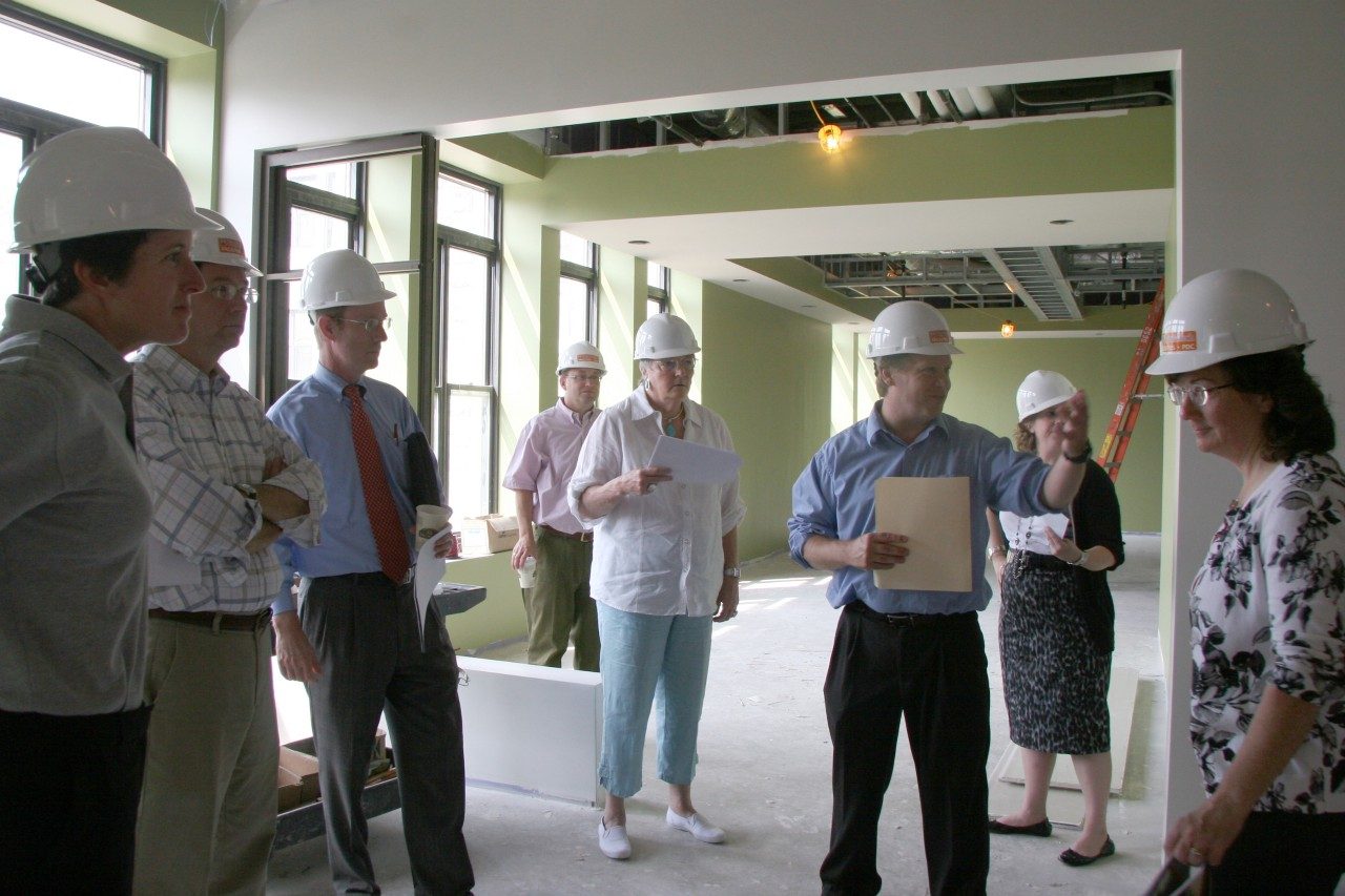 Administrators from across the university tour the future home of the new residential colleges during the Ambler Johnston Hall renovation.