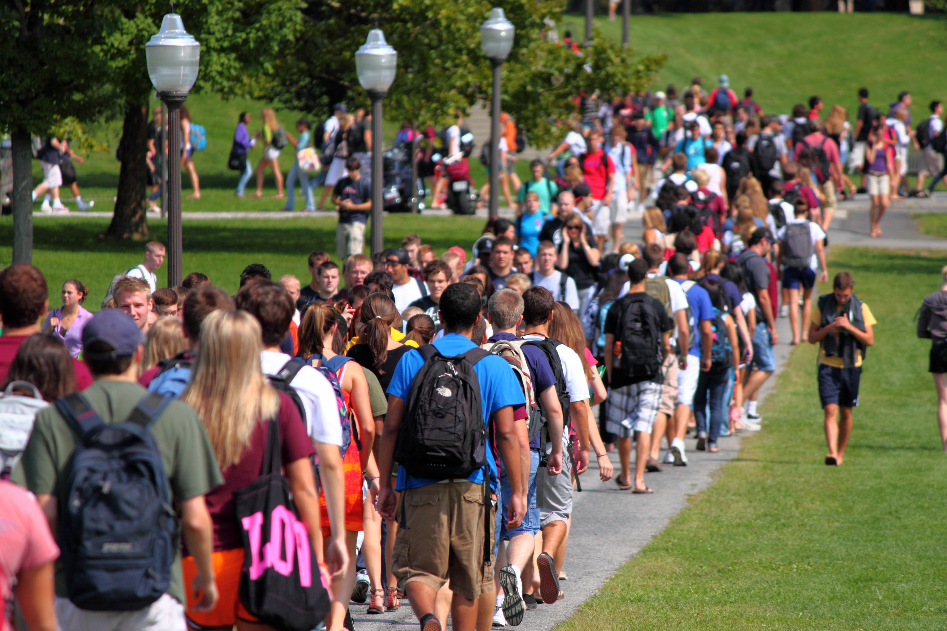 Virginia Tech students cross the Drillfield