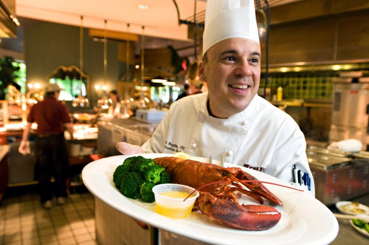 Mark Bratton, executive chef of Virginia Tech's West End Market, serves specialties like lobster and London broil to more than 5,500 students daily.