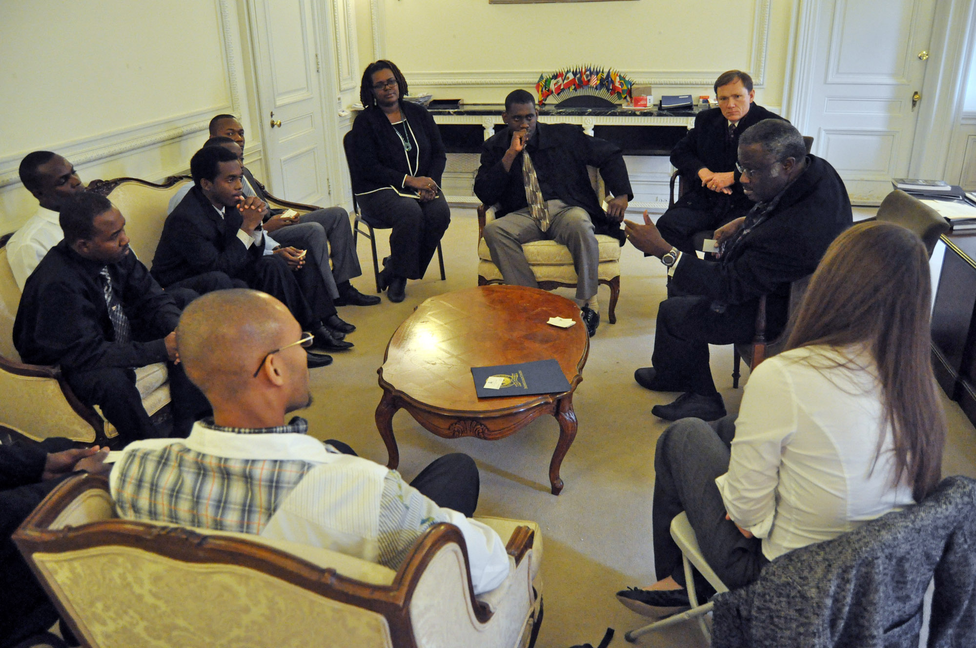 Haitian Ambassador Louis Harold Joseph answers interns' questions during a visit to Washington, D.C.