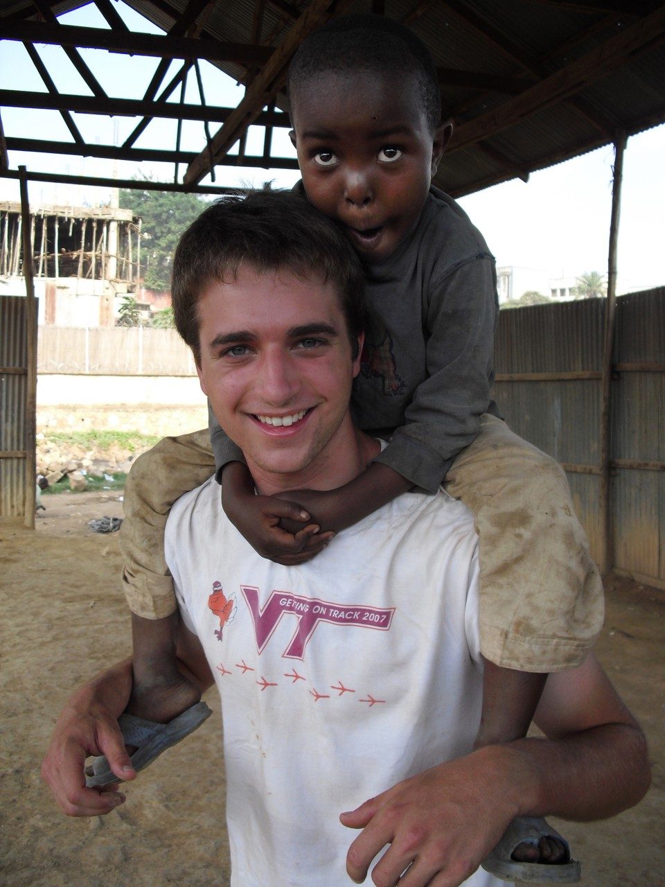 Matt Capelli, a graduate student in civil engineering in the College of Engineering as well as the Pamplin College of Business MBA program, with a child