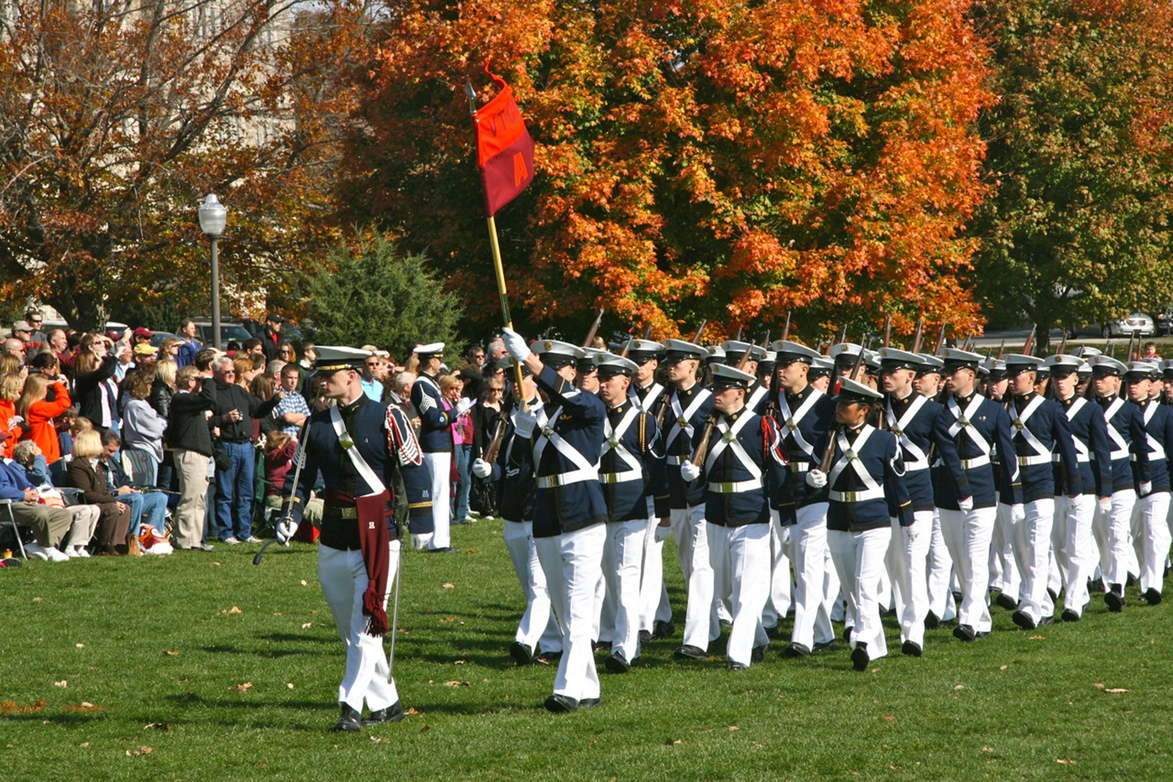 Members of Alpha Company pass in review during the Family Day parade in 2010