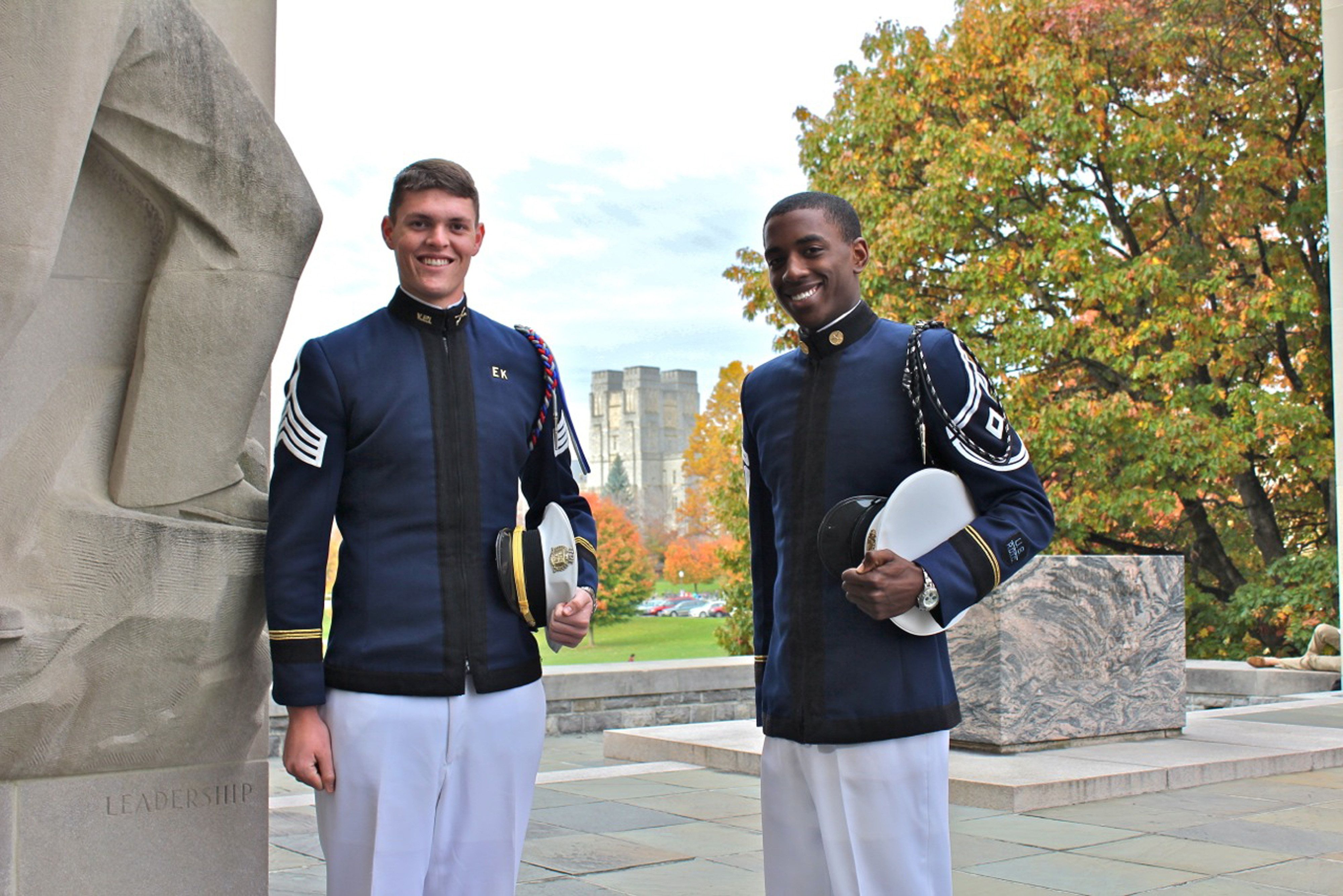 From left to right are Cadets James Harvey and Luke Carpenter standing at the War Memorial