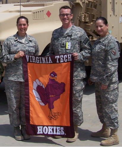 From left to right are Maj. Lisa Wnek, Air National Guard, Virginia Tech Corps of Cadets Class of 1999, Cdr. Bill Balding, U.S. Navy, Virginia Tech Corps of Cadets Class of 1989, and Lt. Col. Katy Garza-Bair, U.S. Army, Virginia Tech Corps of Cadets Class of 1985 while deployed in Afghanistan.
