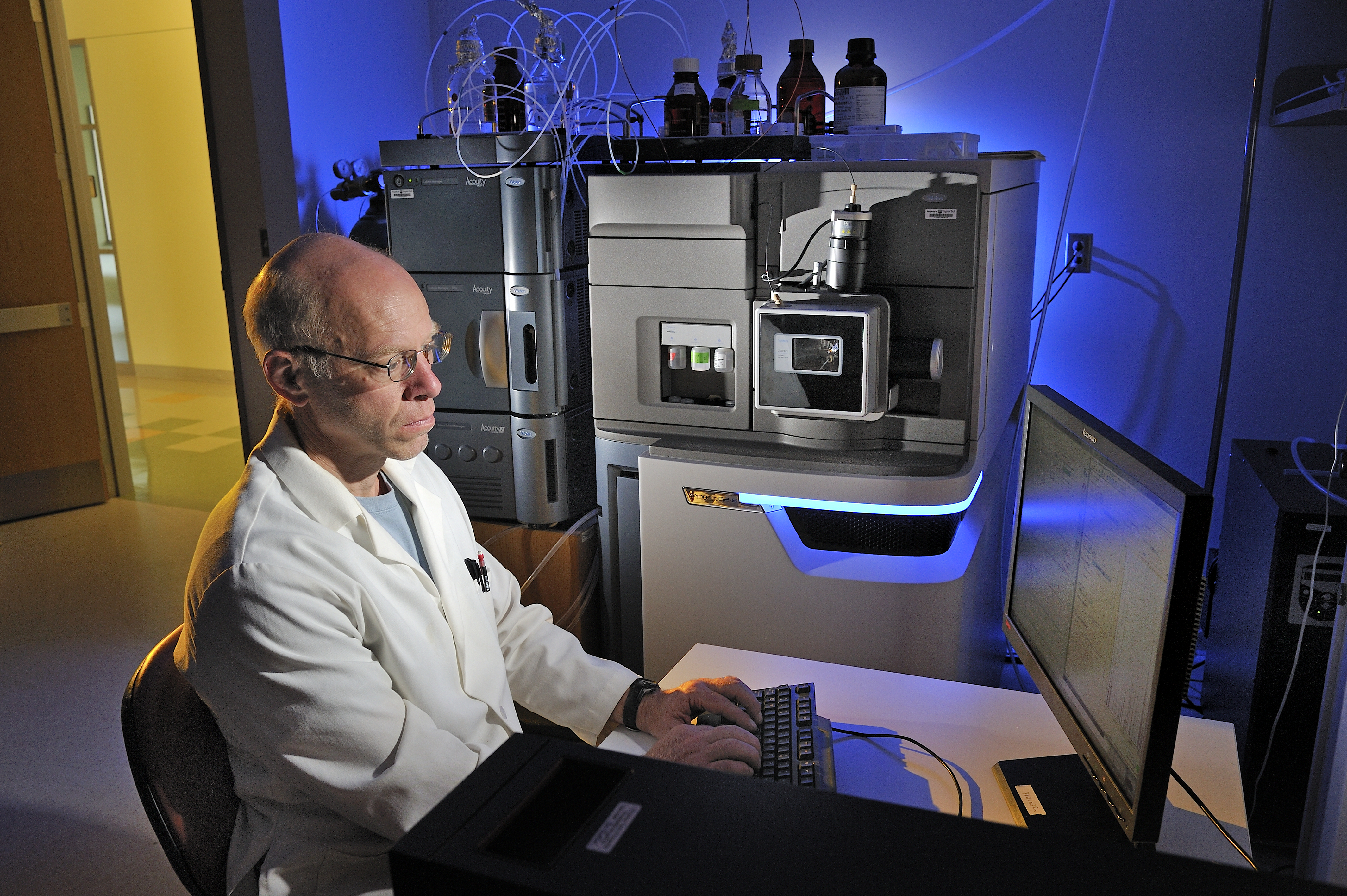 Rich Helm, an associate professor of biochemistry in the College of Agriculture and Life Sciences, uses the new liquid chromatography-mass spectrometer housed in the college.