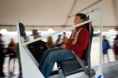 Teen riding seatbelt demo