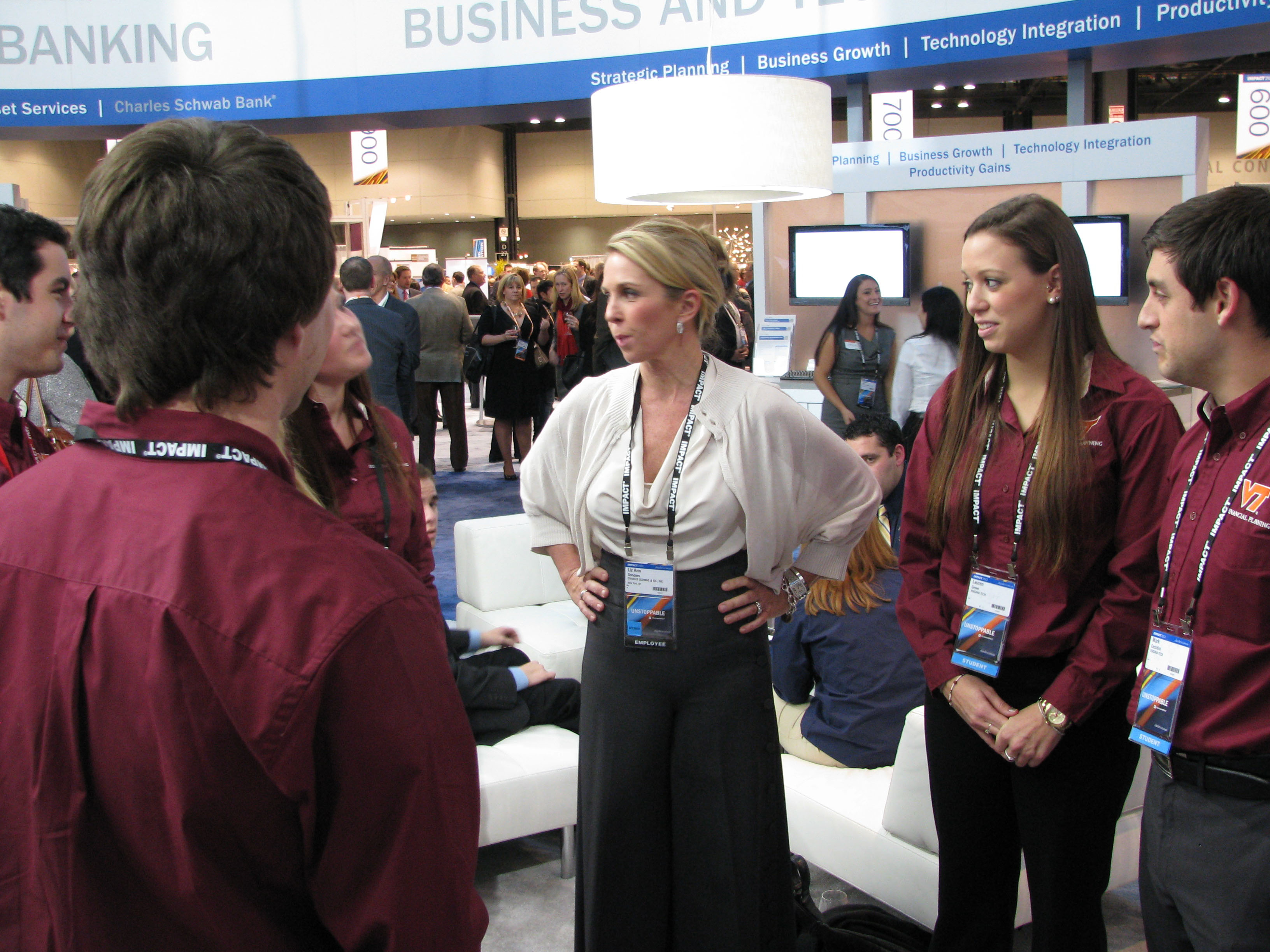 Liz Ann Sonders, chief market strategist for Charles Schwab, chats with Virginia Tech students attending Schwab's Impact conference in Chicago last November. 