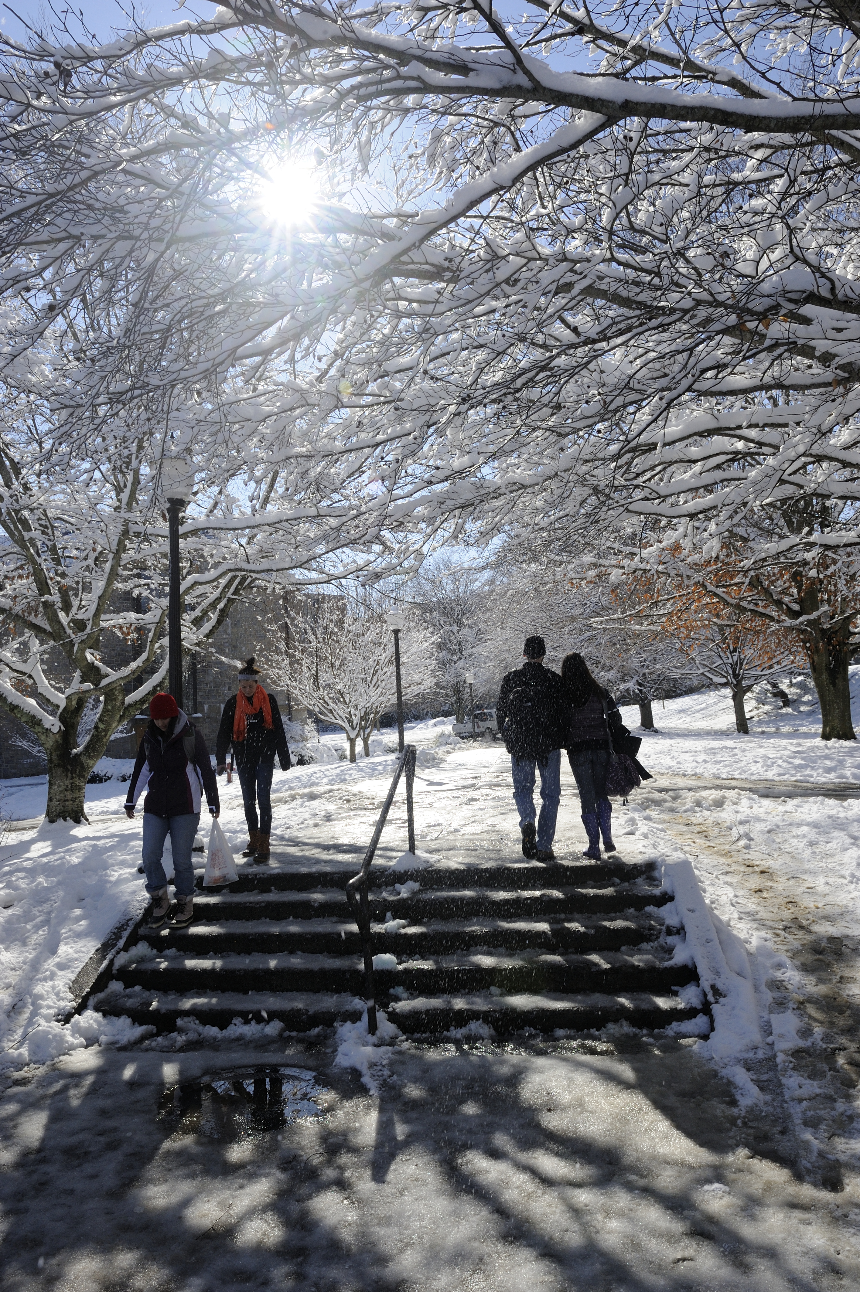 Students walk across campus after a recent snowfall