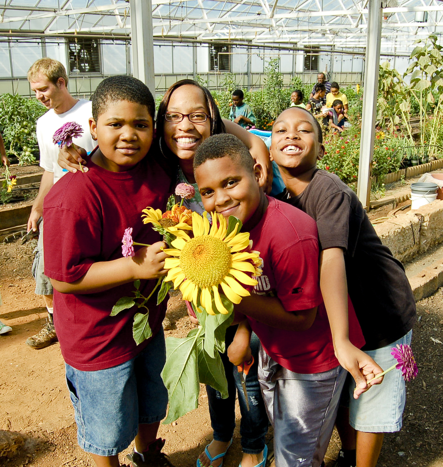 Children with sunflower.