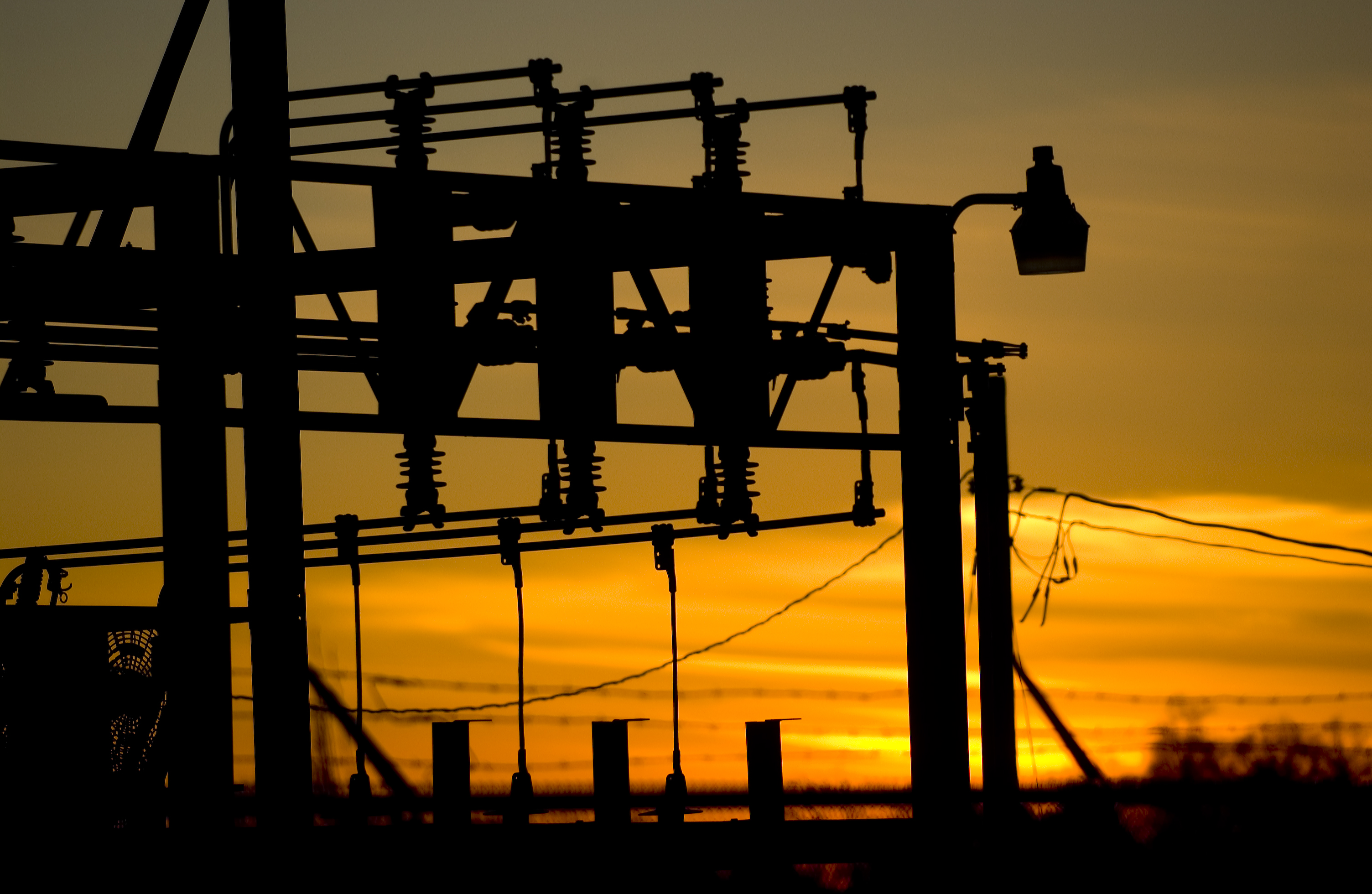 photo of power station lines at sunset
