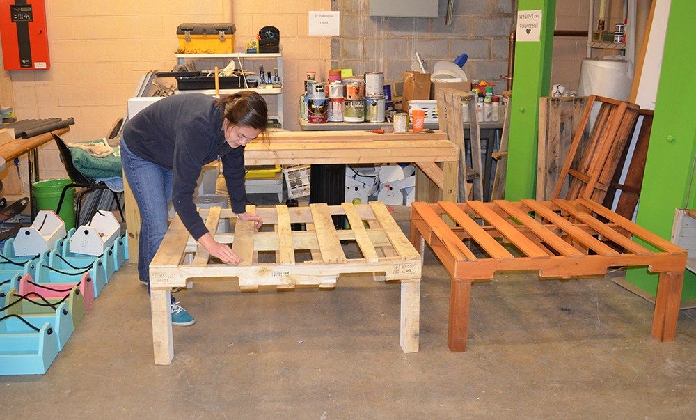 Cassidy Kees helps build furniture and repurpose donations at the Habitat for Humanity ReStore in Christiansburg, Virginia, as her federal work study job.