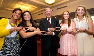 Four sorority sisters with former Virginia Tech president