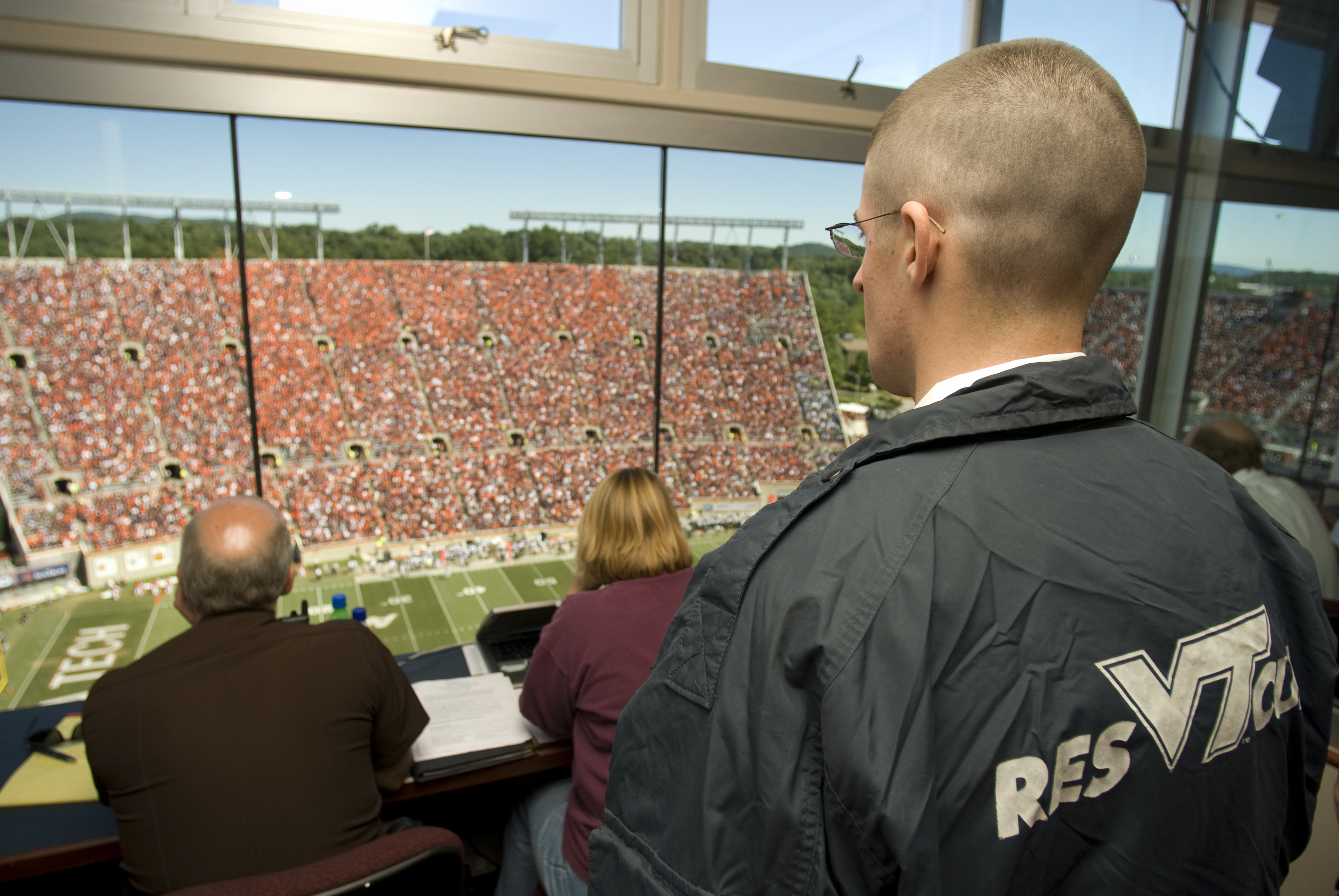 VT rescue squad personnel overlook the crowd at Lane Stadium during a home football game.