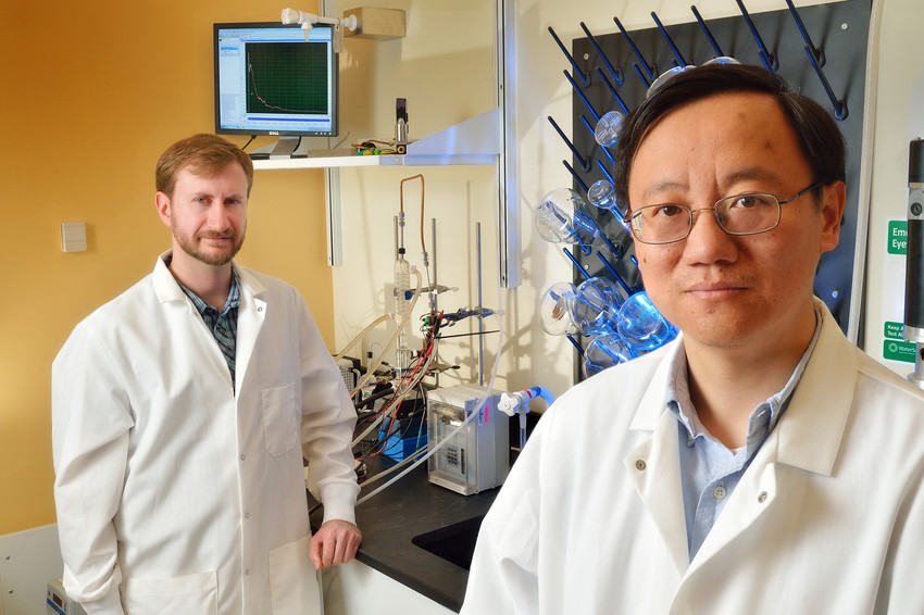 Virginia Tech professor Percival Zhang, at right, and recent doctoral graduate Joe Rollin.