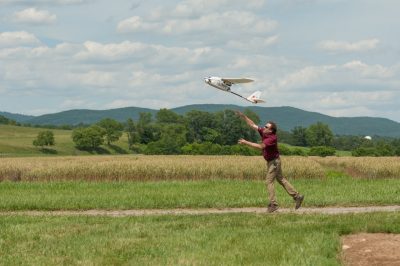 As part of the traffic-management test, John Coggin, chief engineer for the Virginia Tech Mid-Atlantic Aviation Partnership, launches a fixed-wing unmanned aircraft which flew beyond its operator's visual line of sight on a simulated mapping mission. Coordinating the flights of different types of aircraft performing different tasks will be necessary for managing real-world unmanned aircraft traffic. 