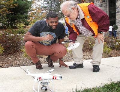 Marquis Harper, student at North Carolina Agricultural and Technical State, left gets some instruction form Dan Swafford, project associate at the Virginia 4-H, October 16,  during a drone demonstration at the Human and Agricultural Biosciences Building. 