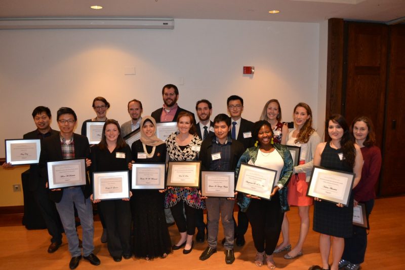 a group photograph of the outstanding master's and doctoral degree students honored at the Graduate School awards banquet during Graduate Education Week.