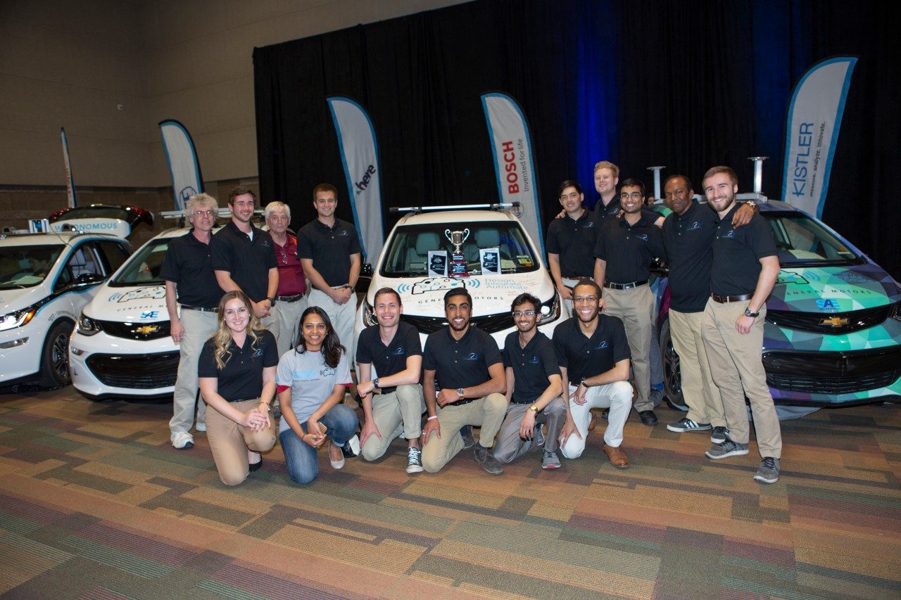 Victor Tango AutoDrive Team with their vehicle. Photo courtesy of SAE International.