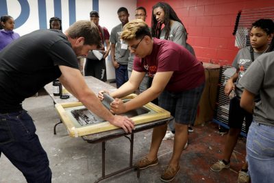 High school seniors experiment with screen printing during the Black College Institute at Virginia Tech.