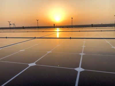 The Dubai sun sets on solar panels being used for FutureHAUS Dubai. (Photo by Laurie Booth)